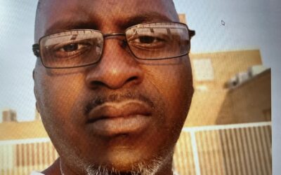 Rally demands justice for Charles Adair